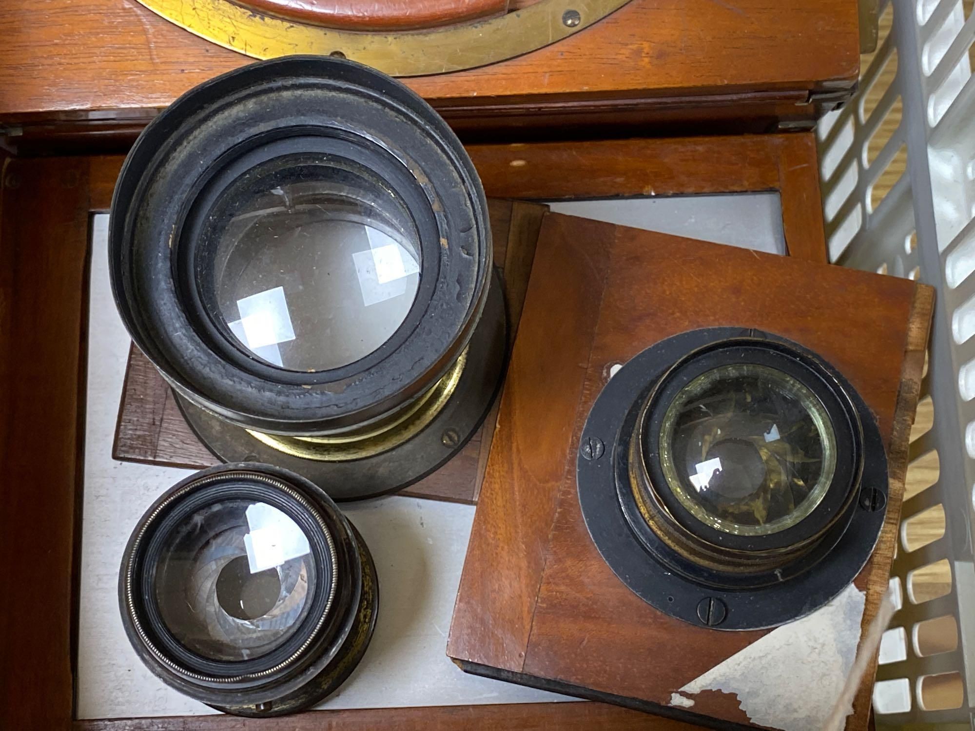 A Thornton Pickard Ruby folding mahogany and brass camera and a similar Spiers and Ponds camera